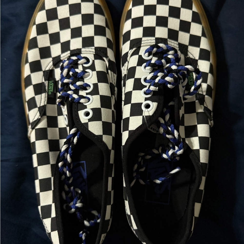 Vans Black and White Checkered Shoes with Blue Laces